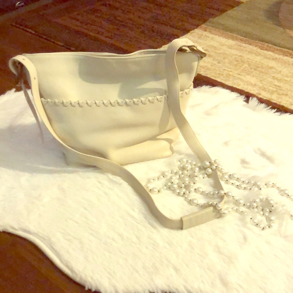 Stunningly beautiful cream leather bag.